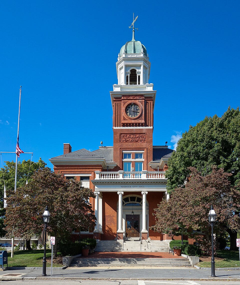 Bob Cushman standing in front of Warwick City Hall